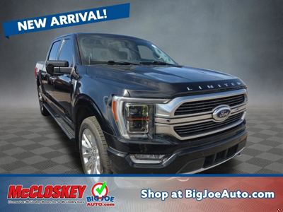Dark blue Ford F-150 Limited pickup